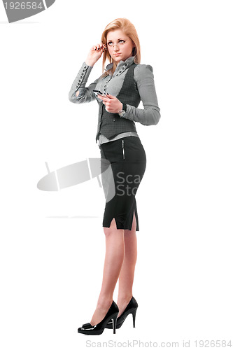 Image of Pretty young blonde with smartphone. Isolated