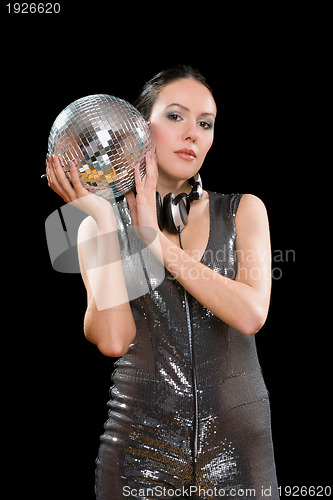 Image of Portrait of nice young brunette with a mirror ball