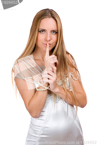 Image of girl with finger to her lips