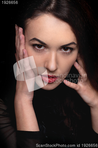 Image of Closeup portrait of passionate young woman