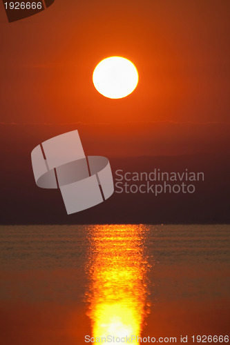 Image of Red sunset over a sea surface