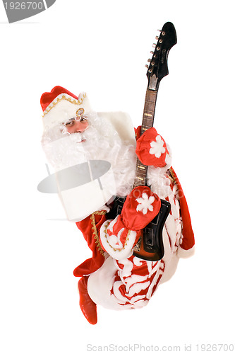 Image of Mad Ded Moroz with a broken guitar