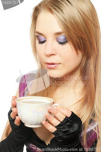 Image of Young beautiful blonde with a cup