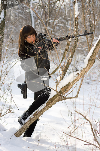 Image of Sexy woman with a sniper rifle