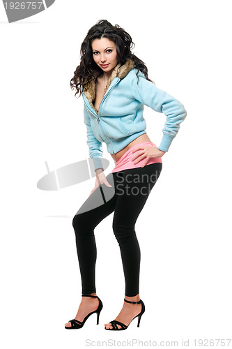 Image of Playful young woman in a black leggings