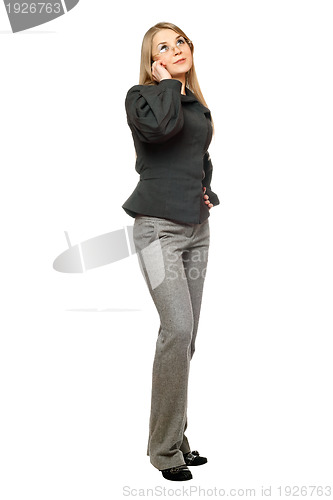 Image of Young woman in a gray business suit