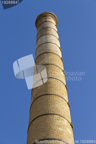 Image of Old fireplace, industrial symbol. In Badalona, Barcelona