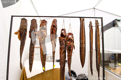 Image of smoke catfish and eels fish sell street fair 