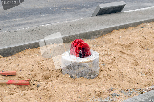 Image of electricity pole line road construction site 