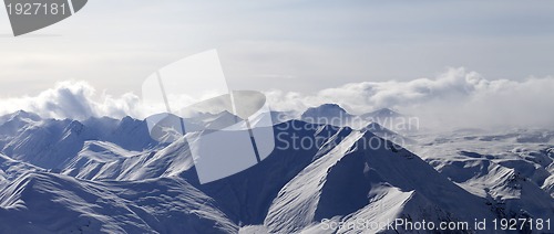 Image of Panorama of evening mountains in haze