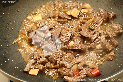 Image of cooking beef with peppers