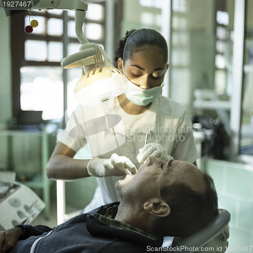 Image of Female dentist during a stomatological procedure