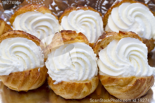 Image of closeup of some profiteroles, lionesas