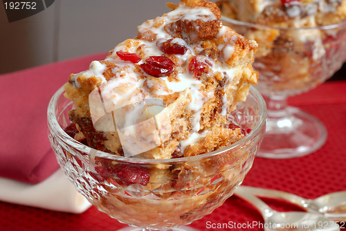 Image of Closeup of two crystal goblets filled with Italian Panettone cra