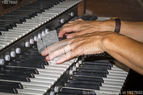 Image of Hand playing piano