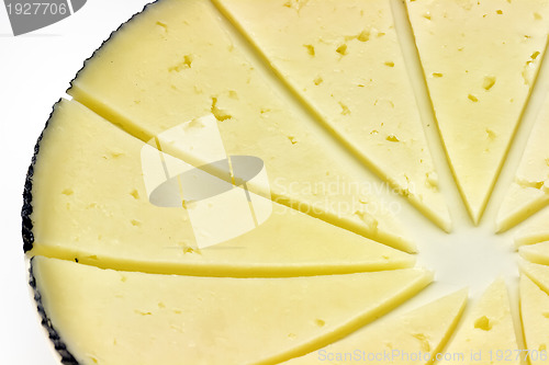 Image of some slices of manchego cheese