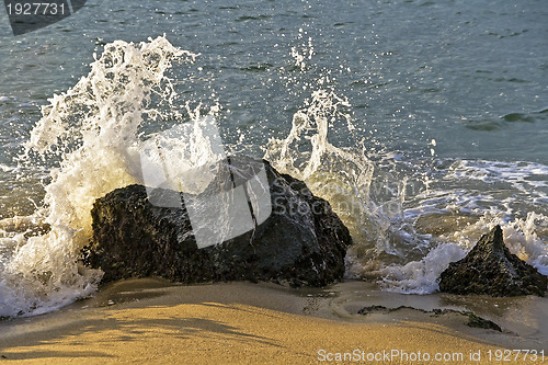 Image of Wave breaking on a rock