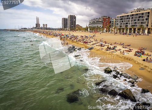 Image of A view of Barceloneta Beach in Barcelona, Spain