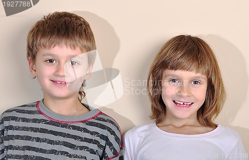 Image of happy smiling elementary age boy and girl