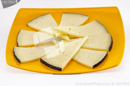 Image of some slices of manchego cheese