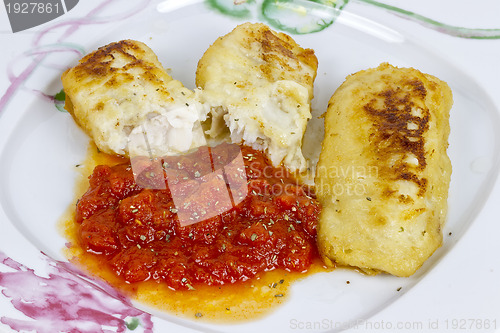 Image of hake fillet with fresh tomato sauce