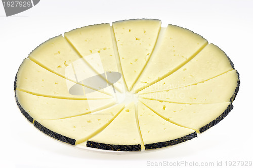 Image of some slices of manchego cheese