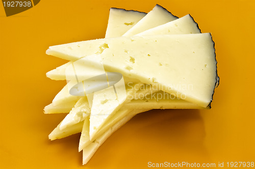 Image of some slices of manchego cheese