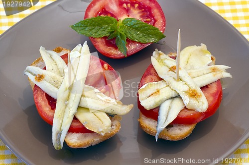 Image of skewer of pickled anchovies