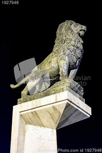 Image of lion sculptures against bright 