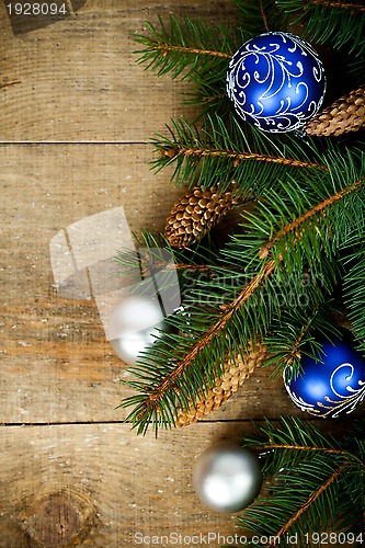 Image of christmas fir tree with pinecones and decorations