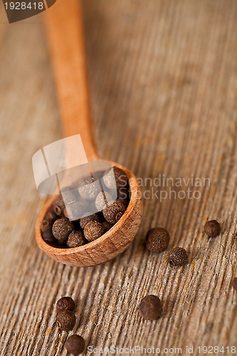 Image of pimento in wooden spoon 