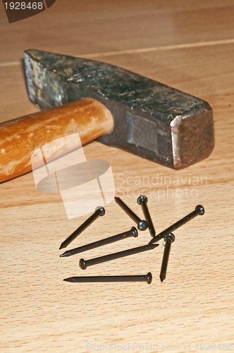 Image of hammer with nails