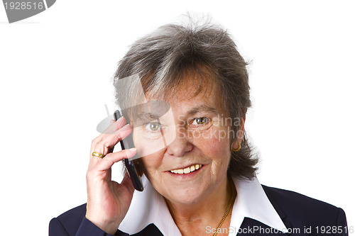 Image of Successful female senior with cellphone