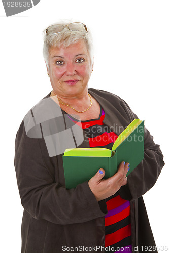Image of Female senior reading a book