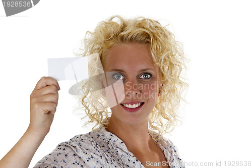 Image of Smiling woman holding up a blank business card