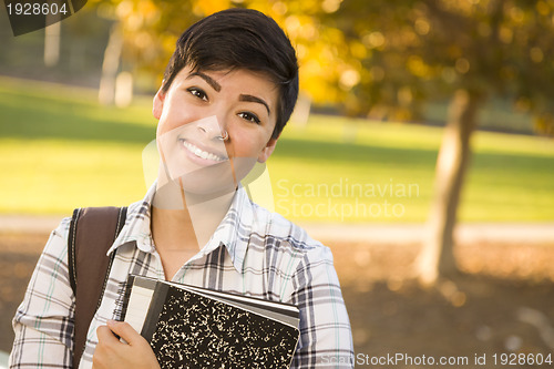 Image of Portrait of a Pretty Mixed Race Female Student Holding Books