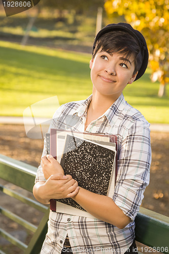 Image of Portrait of Mixed Race Female Student Looking Away 