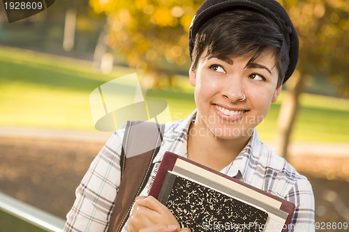 Image of Portrait of Mixed Race Female Student Looking Away 