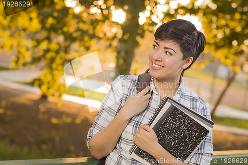 Image of Portrait of Mixed Race Female Student Looking Away 