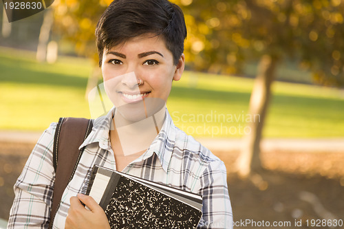 Image of Portrait of a Pretty Mixed Race Female Student Holding Books