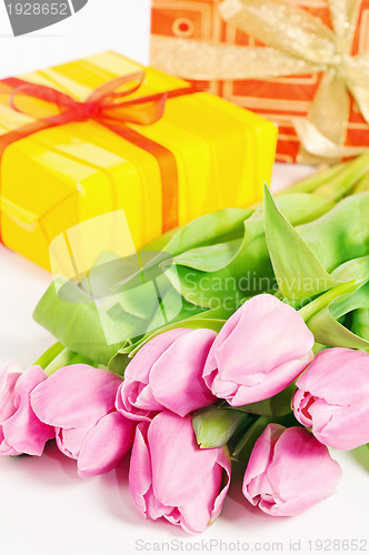Image of Pink tulips and gift box, it is isolated on white