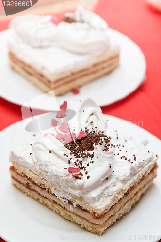 Image of Puff cake with whipped cream, a close up