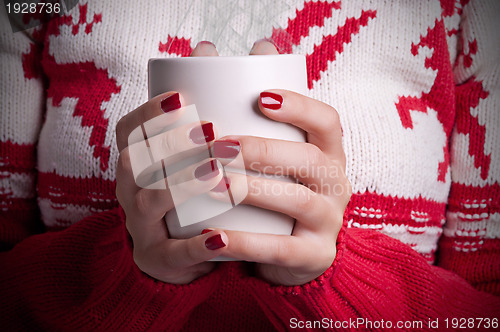 Image of Holding a mug