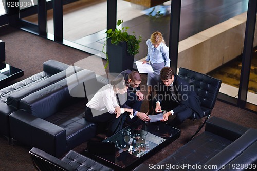 Image of business people in a meeting at office