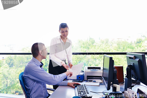Image of business people in a meeting at office
