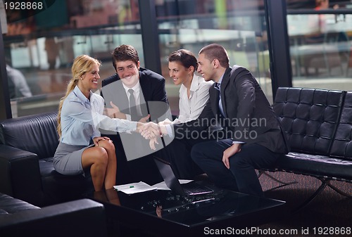 Image of business people making deal