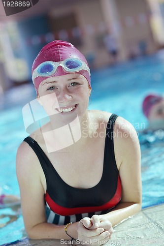 Image of happy child on swimming pool