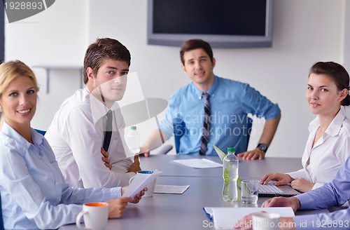 Image of business people in a meeting at office