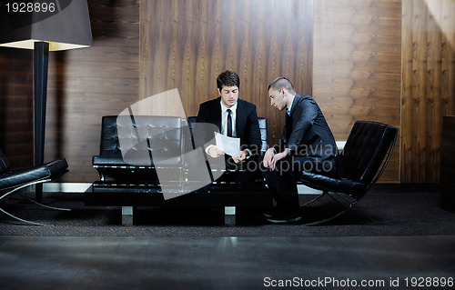 Image of business people making deal