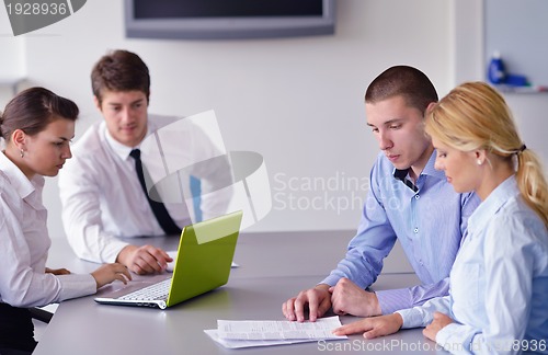 Image of business people in a meeting at office